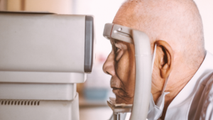 Floaters after 50 : an old asian man getting an eye examination